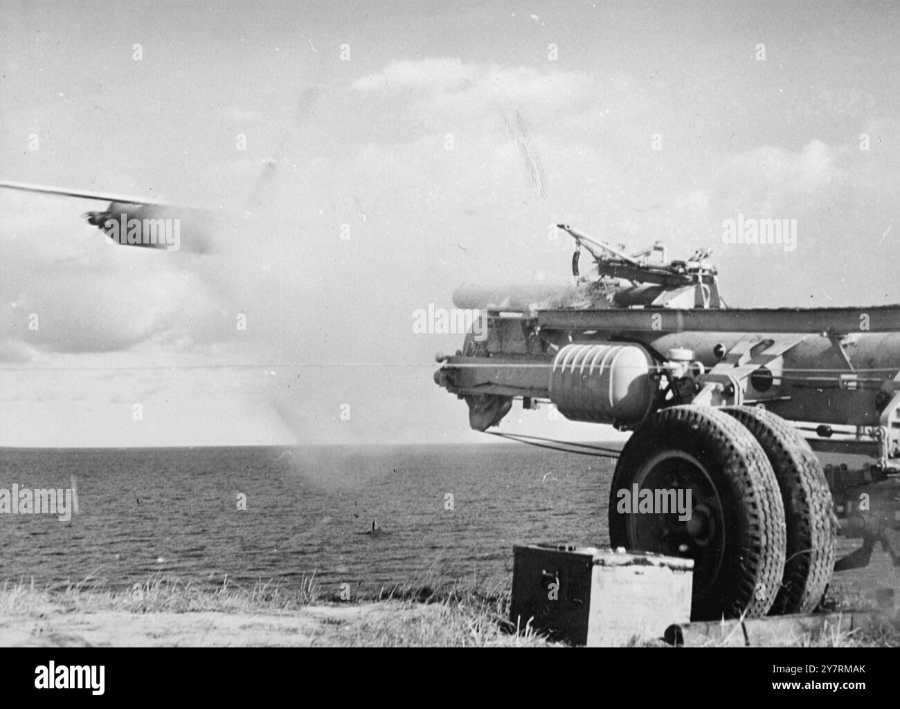 PILOTLESS AIRCRAFT LAUNCHED IN DENMARK. 9.10.53. The American-designed pilotless anti-aircraft target plane was flown in Europe for the first time yesterday when Danish marines launched one over the sea. I.N.P. photo shows the aircraft leaving its launching ramp.  International News Photos Stock Photo