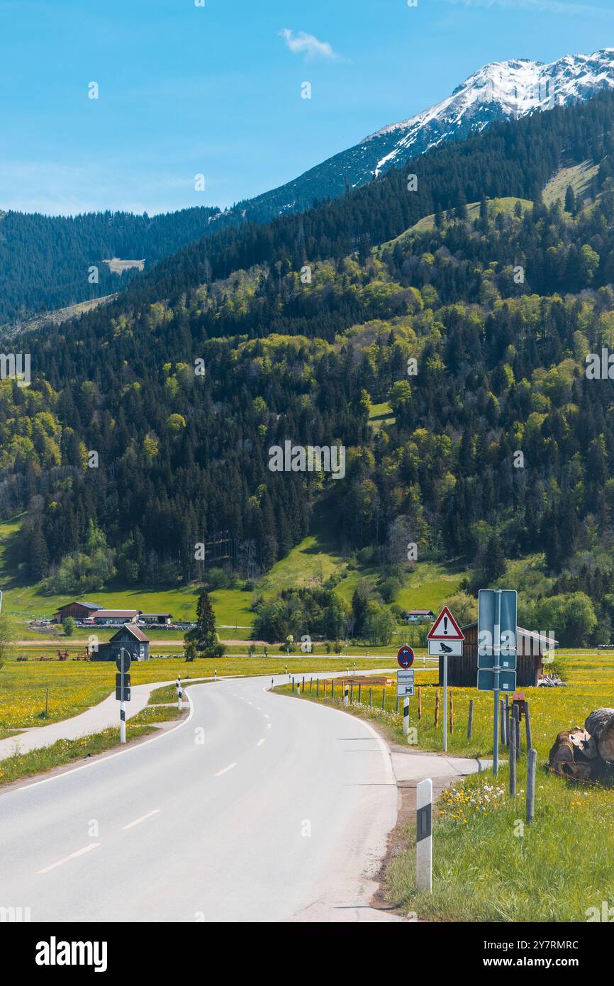 Winding road through mountains, Ruby Oberstdorf Germany, Alps Stock Photo