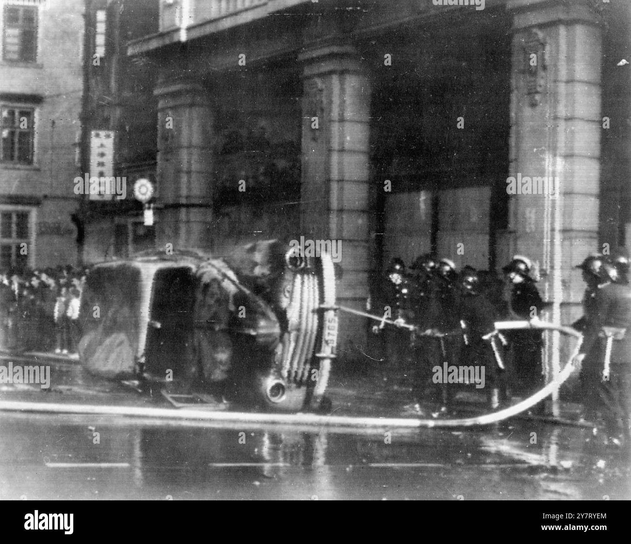 RIOTS - POLICE CAR OVERTURNED DURING RIOTS Stock Photo - Alamy