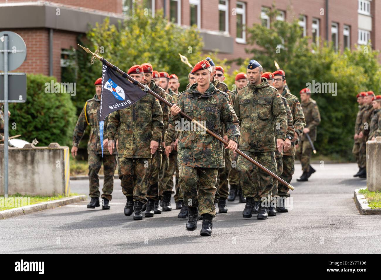 Volkach, Bavaria, Germany - October 1, 2024: Roll call of the German Armed Forces in the Mainfranken barracks in Volkach for the change of subordination of the logistics battalions 461, 467, 471 and 472 under the logistics regiment 4. march-in of the battalions *** Appel der Deutschen Bundeswehr in der Mainfranken-Kaserne in Volkach zum Unterstellungswechsel der Logistikbataillone 461, 467, 471 und 472 unter das Logistikregiment 4. Einmarsch der Bataillone Stock Photo