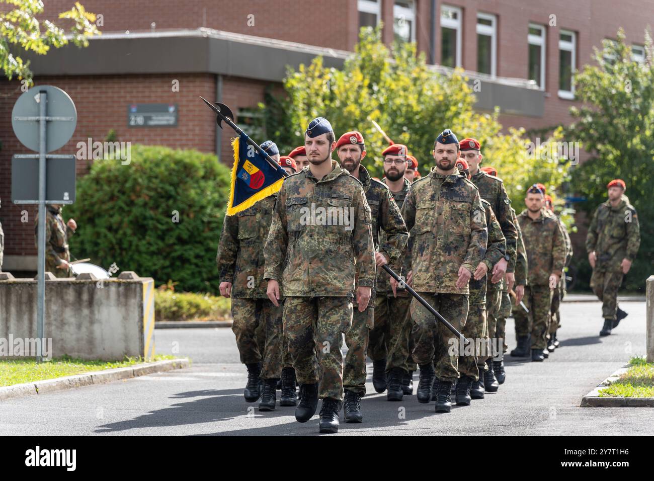 Volkach, Bavaria, Germany - October 1, 2024: Roll call of the German Armed Forces in the Mainfranken barracks in Volkach for the change of subordination of the logistics battalions 461, 467, 471 and 472 under the logistics regiment 4. march-in of the battalions *** Appel der Deutschen Bundeswehr in der Mainfranken-Kaserne in Volkach zum Unterstellungswechsel der Logistikbataillone 461, 467, 471 und 472 unter das Logistikregiment 4. Einmarsch der Bataillone Stock Photo