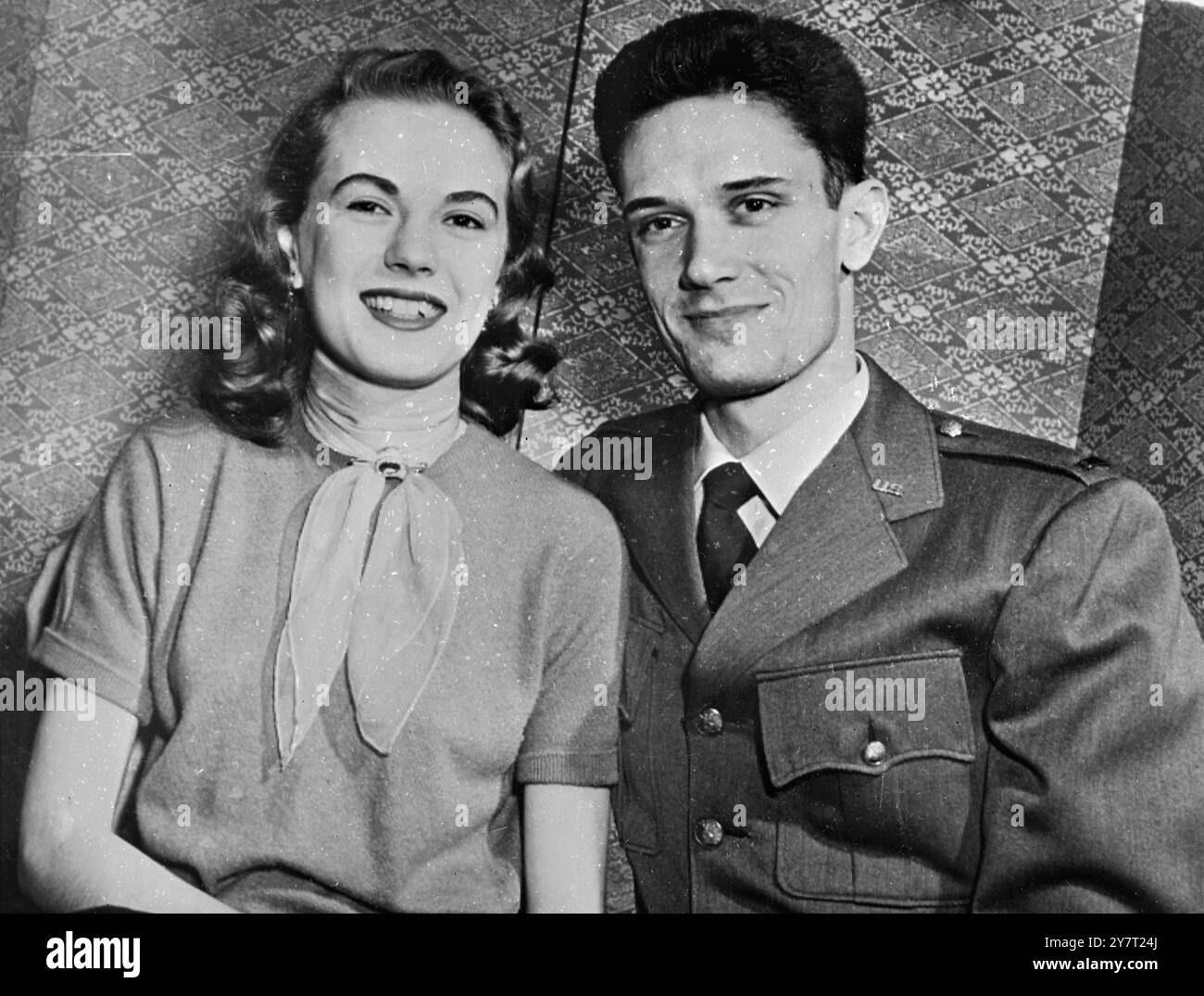 IT WILL BE AN ALL-AIR FORCE WEDDING DAUGHTER OF U.S. AIR FORCE IN GREAT BRITAIN COMMANDER TO MARRY CHIEF OF STAFF'S SON 6-2-52 I.N.P. PHOTO SHOWS:- Sue Rosannah Johnson, 19, daughter of Major General Leon Johnson, Commander of the U.S.Air Force in Great Britain, and Lieut Hoyt Samford Vendenberg, Junior, son of General Vandenberg, Chief of Staff of the U.S. Air Force, smile happily for our phot ographer at Fort Myer, Virginia, U.S.A. Miss Johnson's parents have announced her engagement in London, The wedding is scheduled to take place at Mitchel Air Force Base, Long Island, to which General Jo Stock Photo