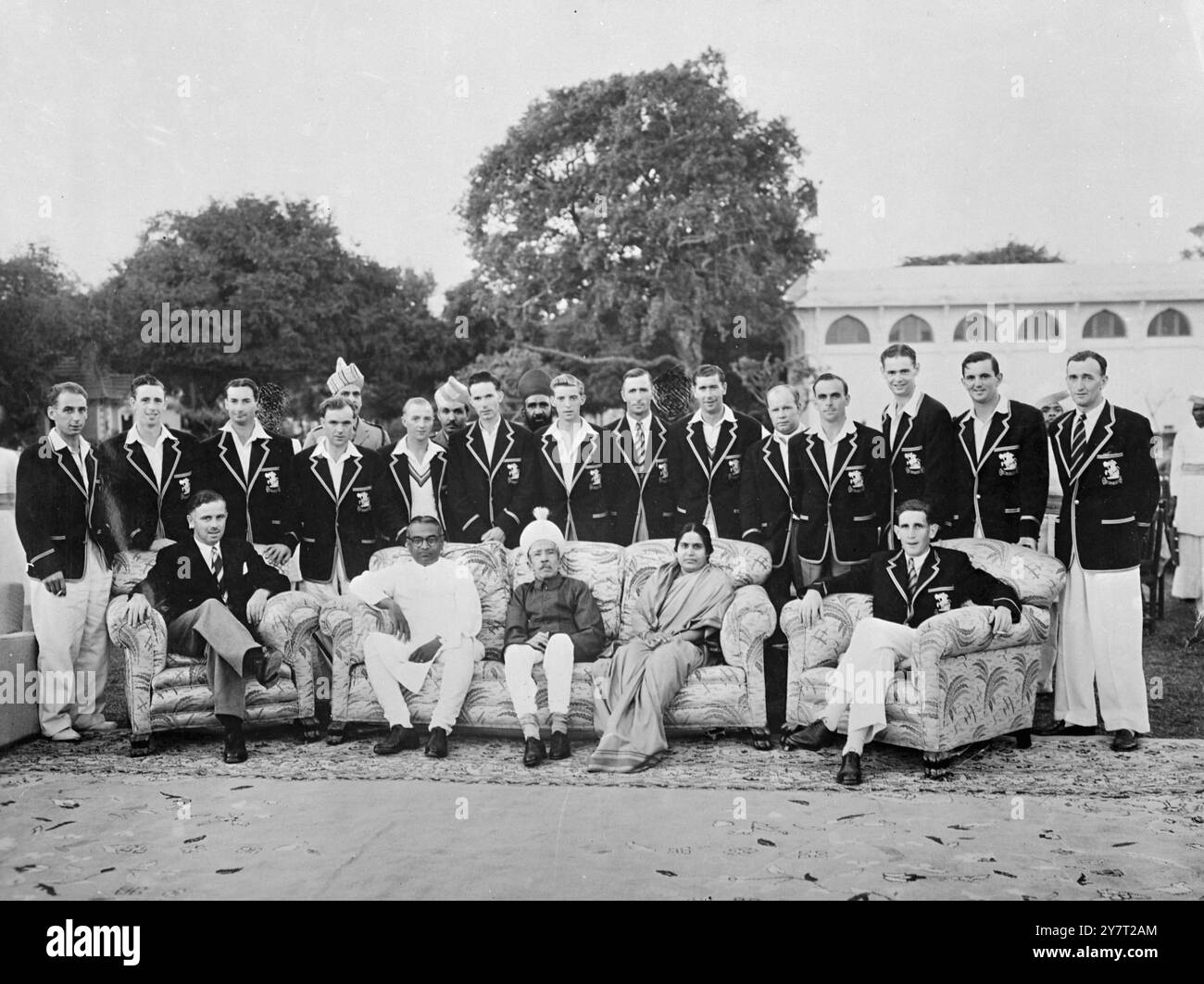 PICTURED WITH THE NIZAM THE M.C.C. TEAM IN HYDERABAD 5-2-52 I.N.P. PHOTO SHOWS:- The M.C.C. Gricket Team photographed when they played Hyderabad . The match ended in a draw with M.C.C. declaring at 441 for 8 wickets. Standing, left to right:- R.T.Spooner, Brian Statham, Donald Kenyon, Edric Leadbeater, Cyril Poole, Frank Lawson, Malcolm Hilton,Jack Robertson,Derek Shackleton, Alan Watkins, Fred Ridgway, Roy Tattersall, Tom Graveney, D.V.Brennan. Sitting, Left to right :- G.M.Howard (Manager), Mr. M.K. Vellodi (Chief Minister), the Nizam of Hyderabad, Mrs. Vellodi, D.B. Carr (Captain) 254/D/593 Stock Photo