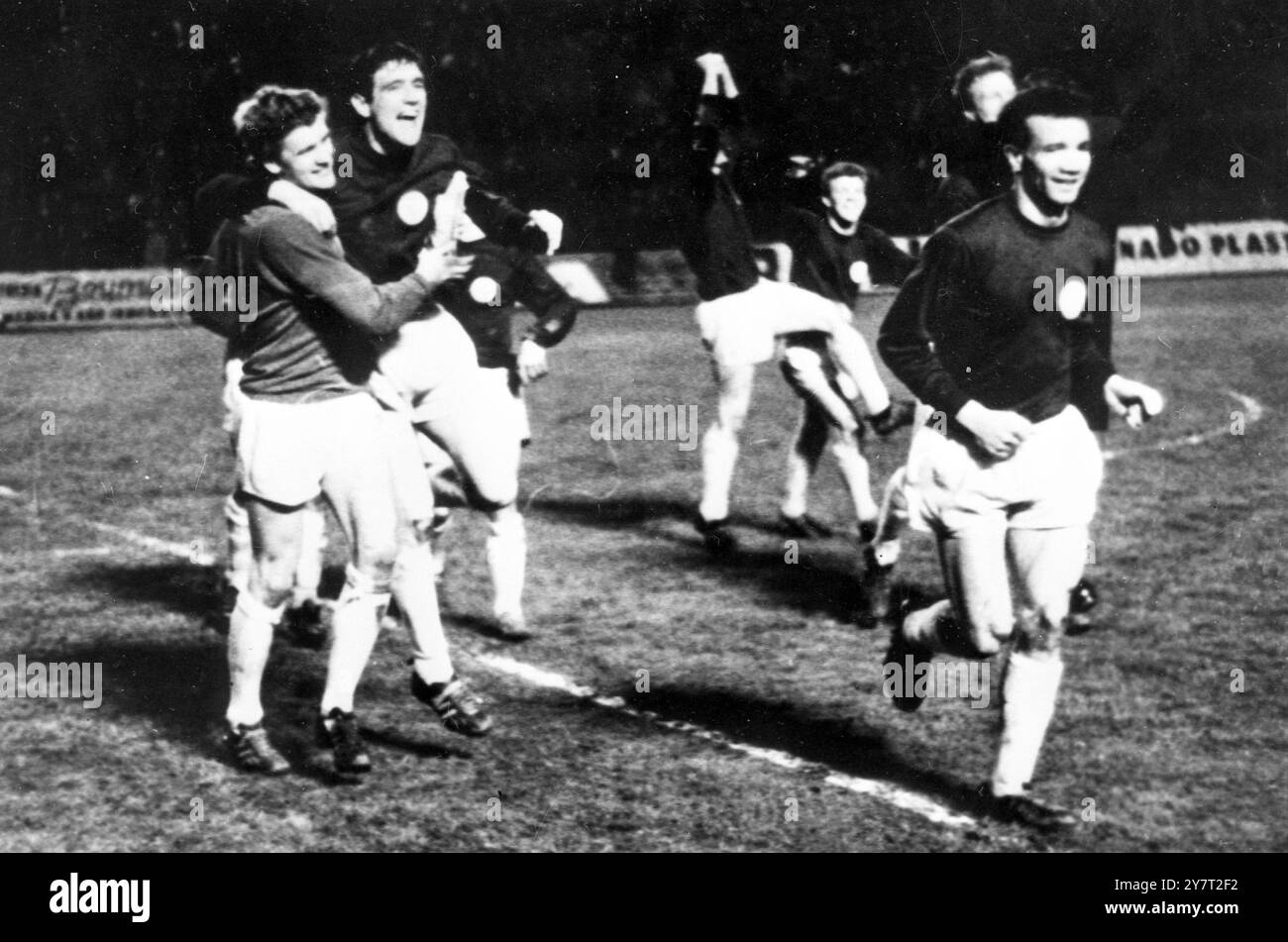 British goalkeeper from Leeds, Gary Sprake is shown making a save in front of Valencia's Waldo (white shirt) during Leeds - Valencia's games here last night for the Fairs Cup. Leeds won 1 - 0. Seen here Leeds celebrating after the match. 17 February 1966 Stock Photo