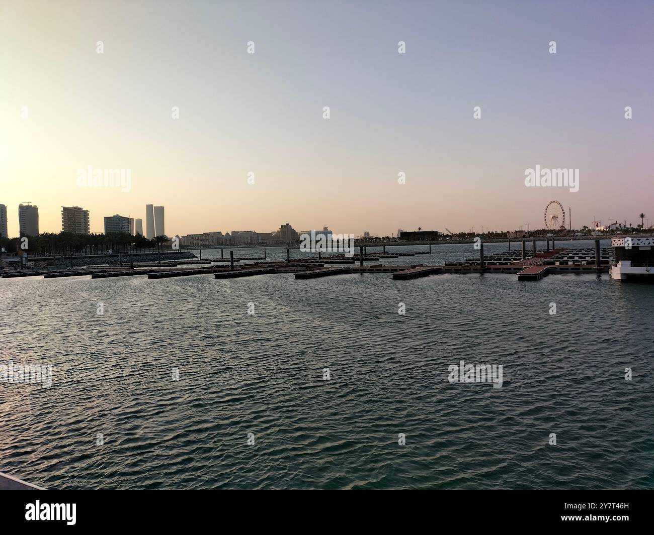 Stunning Sunset Reflections on the Water at Lusail Corniche - Smartphone Captured Stock Image