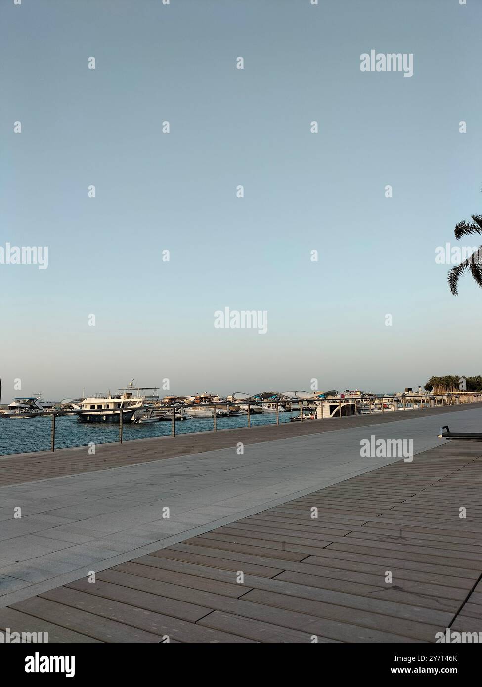 Tranquil Waters and Sunset Glow at the Old Port, Doha - Smartphone Captured Stock Image