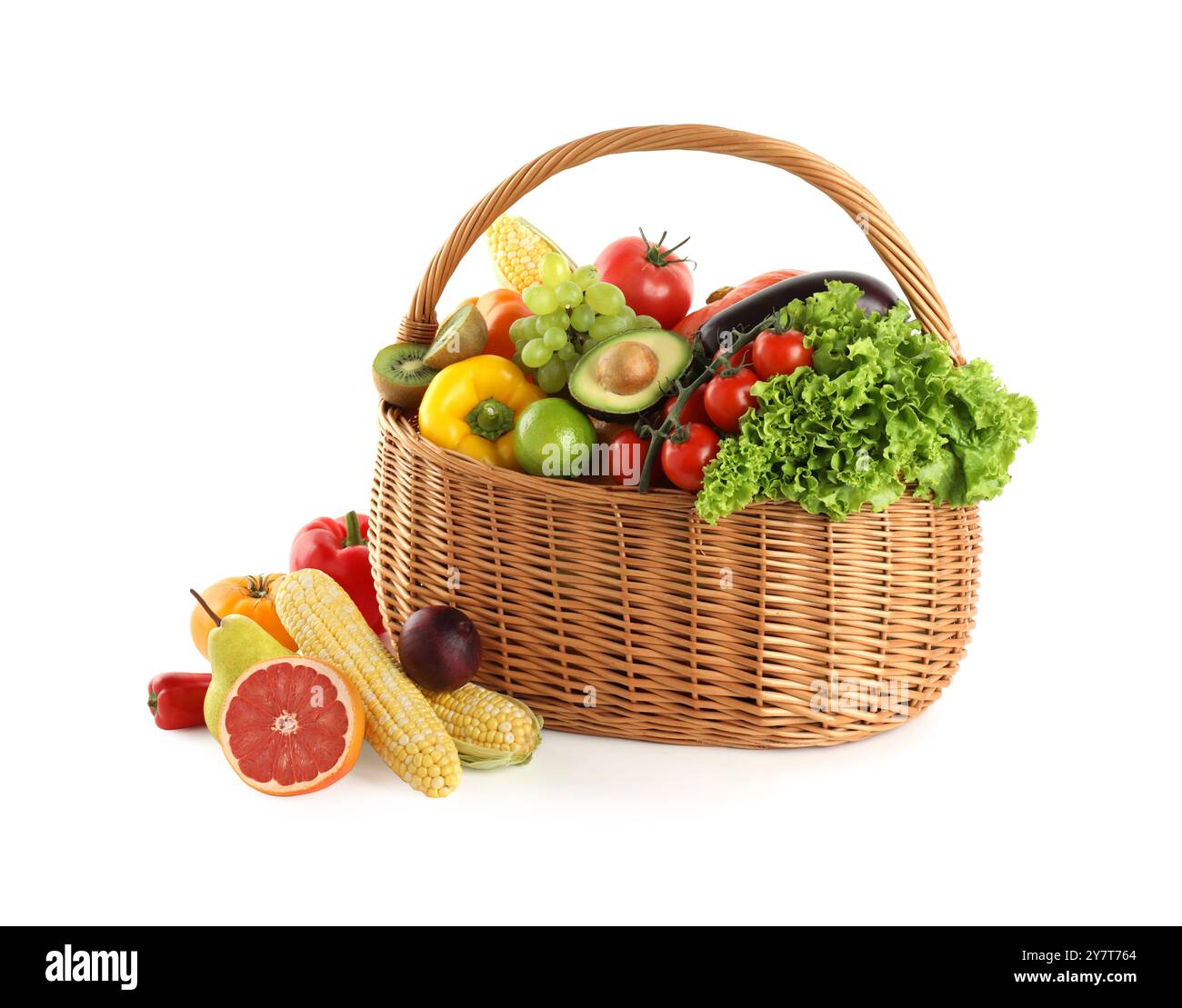 Different fresh vegetables and fruits in wicker basket isolated on ...