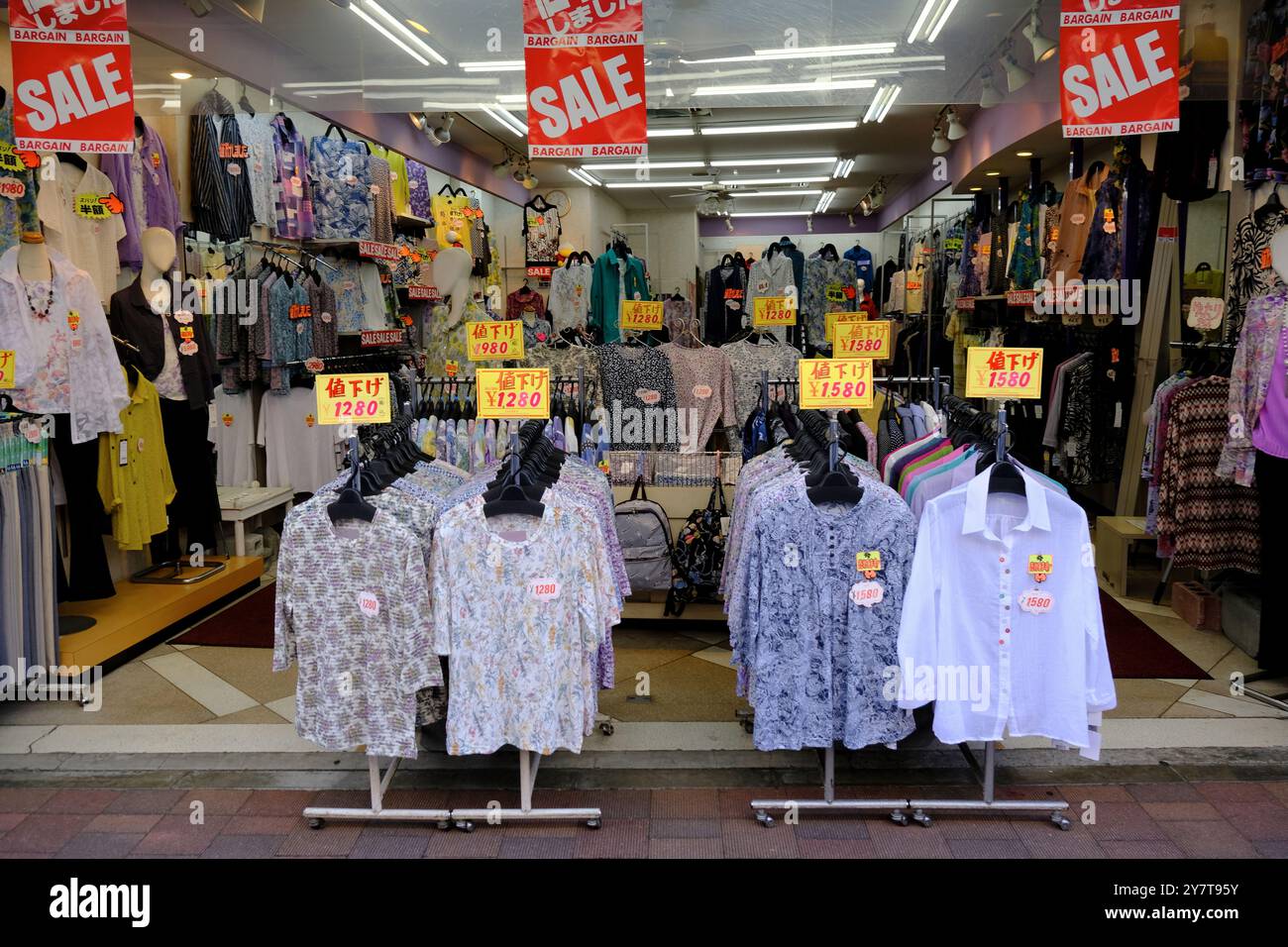 A clothing store specializing the clothes for elderly in Sugamo Jizo dori shopping street.Toshima,Tokyo,Japan Stock Photo