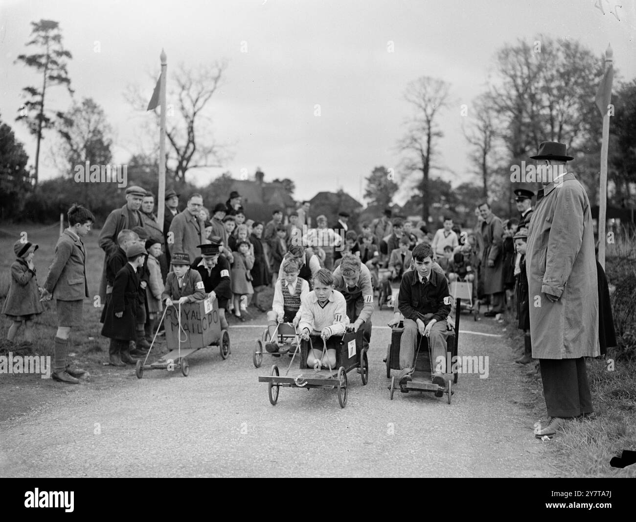 STARTING OFF IN THE SOAP BOX DERBY   20 May 1950    Children of Maidstone (Kent) had their own Derby today (Saturday) a Packing case on wheels Derby, raced with four wheeled barrows made of packing cases or soap boxes and perambulator wheels.  The competitors met in the Mote Park and had to cover a half mile circuit taking them up and down hill and over grass.  Each barrow had a crew of two,  one to steer and one to push.  As well as speed and ability to stay the course, smartness of turn-out and road sense were taken into consideration.  Boys between eight and 14 and girls between 10 ad 14 we Stock Photo