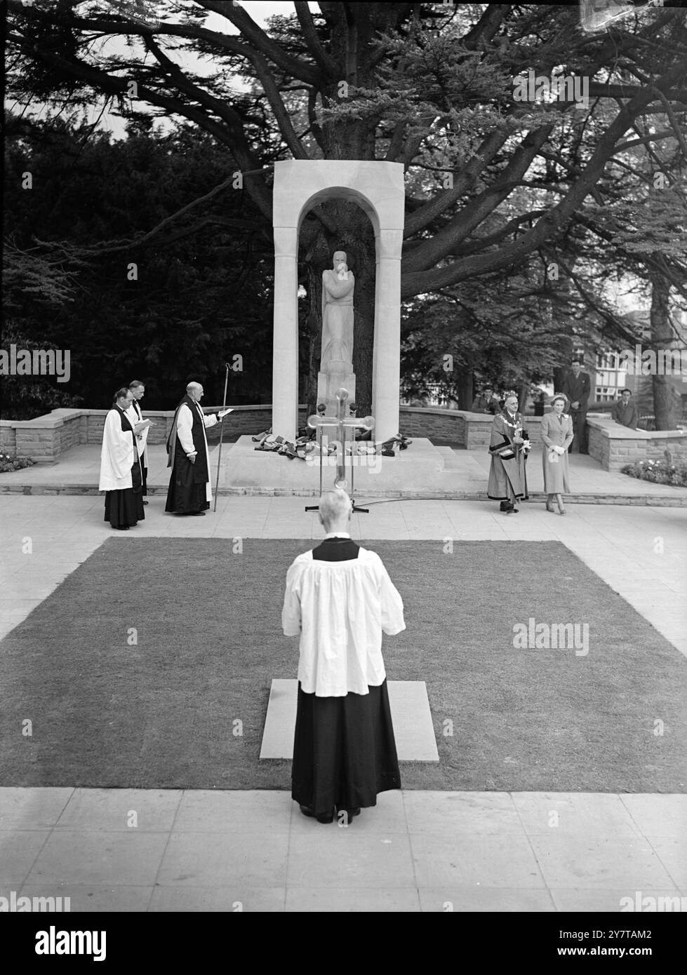 ALDERSHOT'S MEMORIAL TO HEROES 5 May 1950  The Duchess of Gloucester unveiled the Heroes Memorial Shrine in Aldershot Manor Park today (Friday).  Titled Christ the Judge, the shrine was carved by Josephine de Vasconcellos from a Portland Stone monolith.  It was one of the Monoliths laid out on the Isle of Portland for Sir Christopher Wren, who chose the more perfect ones for the columns of St Pauls Catherdral.  The statue, eight feet high, stands in a rock garden made from stones taken from famous buildings destroyed in air attack.  Eighteen cities and 34 boroughs are represented.  The memoria Stock Photo
