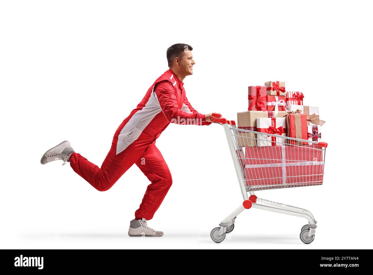 Car racer running with presents in a shopping cart isolated on white ...