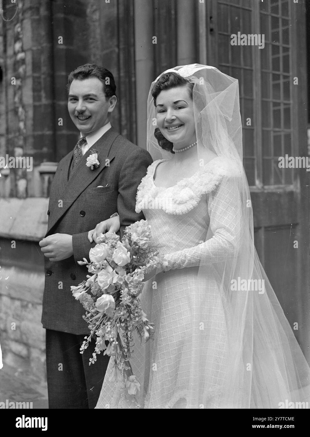 AUSTRALIAN DANCER IS A LONDON BRIDE TODAY    An Australian dancer married a British theatre manager in St Mary Abbots, Kensington, London, today. The bride, who has just returned from a tour of the U.S.f orces in Germany, is miss Patricia Mills, daughter of Mr.and Mrs. Paul Mills of Adelaide, Australia.  The bridegroom is Mr Norman Robert Hope, assistant manager of The Grand Theatre, Leeds. He is the son of Mr.and Mrs. Norman Hope of Hull , Yorks.    PICTURE SHOWS:- The bride and the bridegroom after the wedding today.  21 March 1950 Stock Photo