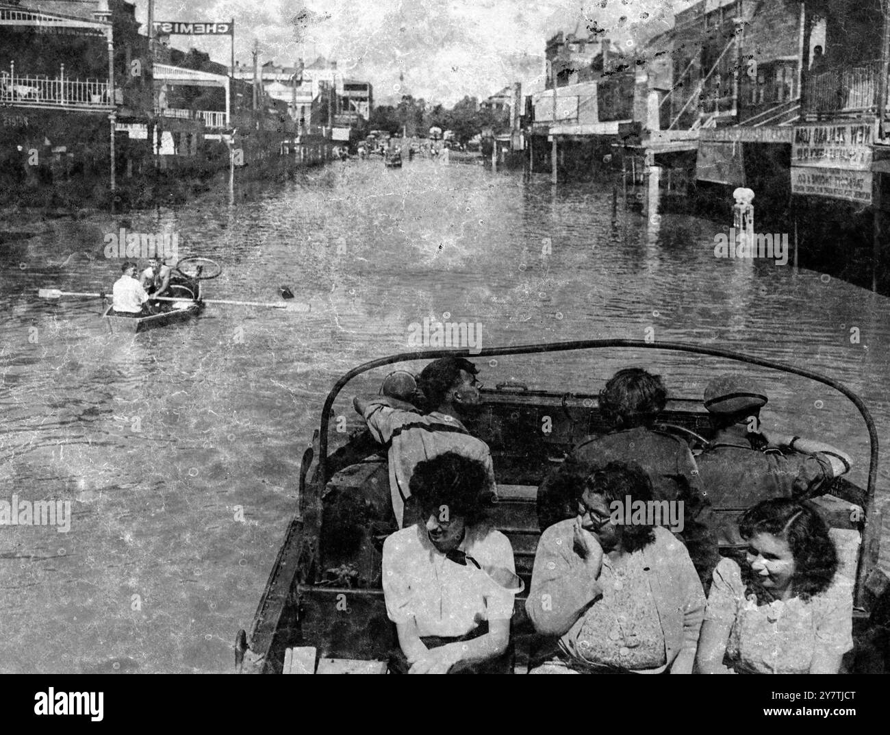Floods in New South Wales , AustraliaWagga Wagga :  An army 'duck ' with rescued aboard sails down Fitzmaurice Street to rescue those trapped by  the rising floodwaters in this New South Wales town.  Heavy rains continue in the area , and several rivers and creeks have burst their banks.  In all a large area is under water in Central New South Wales , crops have been ruined and one man has been drowned and another feared lost 3 April 1950 Stock Photo