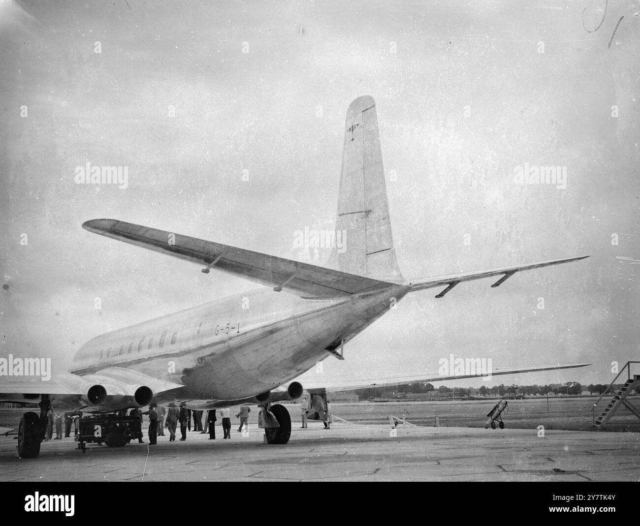 Hatfield  , England :  The De Havilland Aircraft Company 's ' Comet ' jet-propelled airliner - in which there is hope of retrieving the leeway lost in the war when Britain concentrated on combat aircraft - is wheeled out of the factory here for the first time.  This latest experiment in aviation history - the Comet - being the only fully-jet airliner in the world - is powered by four de Havilland ' Ghost ' jet engines , and it is expected to cruise at almost 500 miles an hour - the London-Sydney journey , for instance , will take 36 hours.  The plane , carrying 36 passengers and a crew of four Stock Photo
