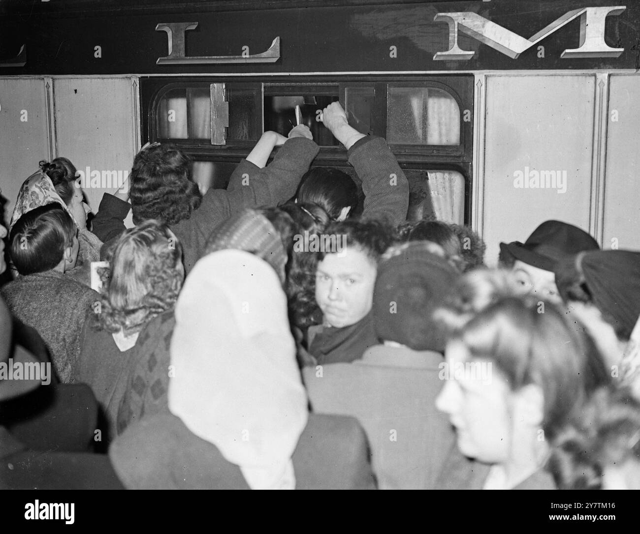 Stan Laurel mobbed on arrival in LondonWhen Stan Laurel arrived at Waterloo station from Southampton they were mobbed by autograph hunters , and in the struggle their car , which was to have taken them to their London hotel, was lost.  Police protected them , and eventually found the car for them - and they drove away.  Photo shows:  Autograph hunters mobbing the railway coach as Laurel and Hardy arrived by train from Southampton at Waterloo  Station , London 10 February 1947 Stock Photo