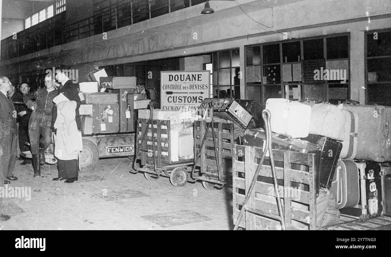 Freight piles up at Le Bourget as passengers pass unsearched in Customs strikeA smugglers' paradise has been created in France by the strike of 100,000 civil servants, including Customs officials for higher pay. At Le Bourget, the Paris airport , passengers are allowed to pass freely with baggage in hand , while freight by the ton accumulates at the Customs building.  Photo shows:  Freight piled on trolleys at Le Bourget during the strike of Customs officials 23 September 1946 Stock Photo