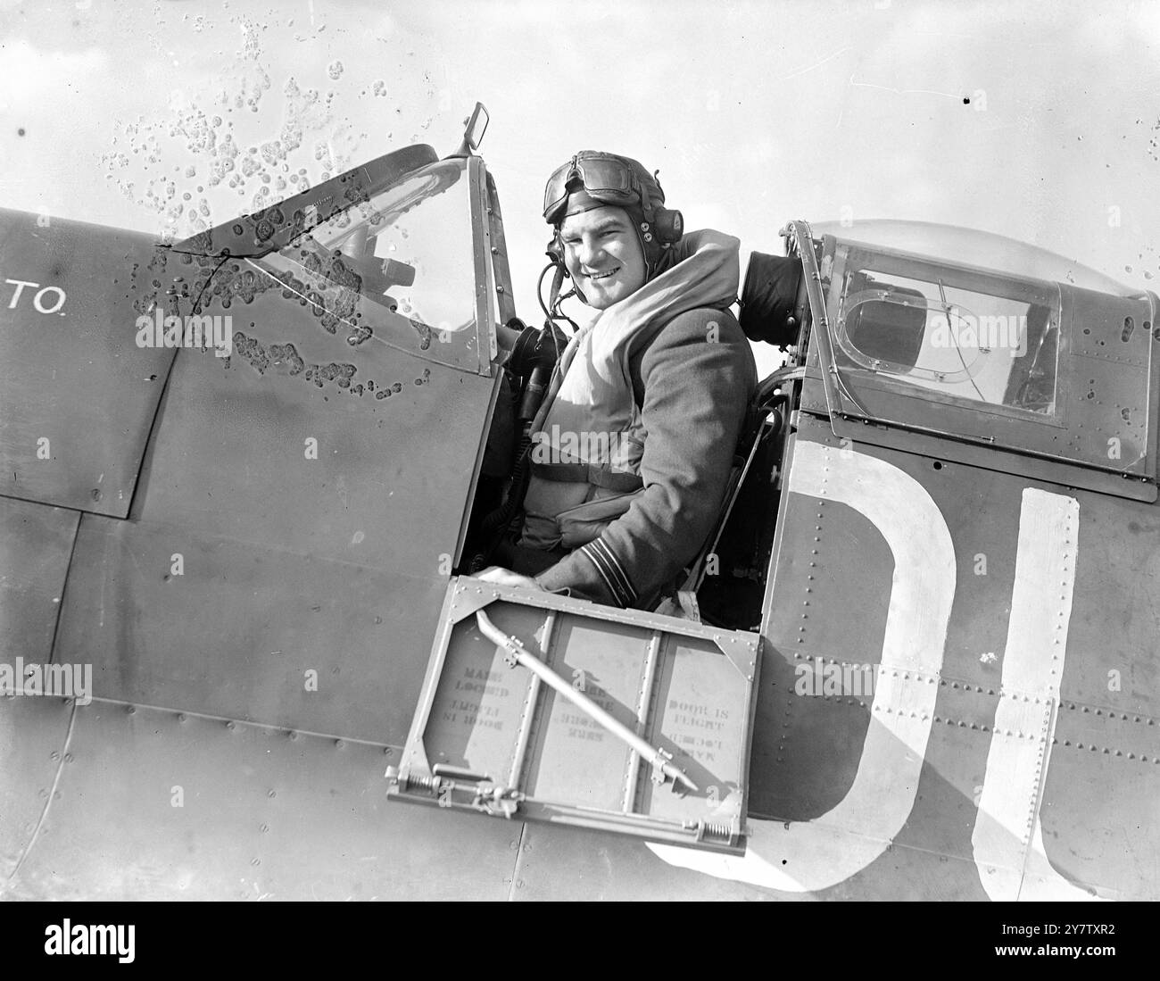 NEW ZEALAND FIGHTER PILOT WITH 'NINE LIVES' A squadron Leader, who comes from New Zealand, and is C O of Scottish Fighter Squadron has escaped death on nine separate occasions, apart from the 60 odd combats he has taken part in since the war began. His escapes include being shot down three times near Dunkirk, a bomb exploding beside his aircraft on an aerodrome (he went into hospital for this), ramming a Messerschmitt in a 700 miles and hour collision, having his plane but in half in another collision, and a parachute jump in which the parachute did not open until he was within 800 feet of the Stock Photo