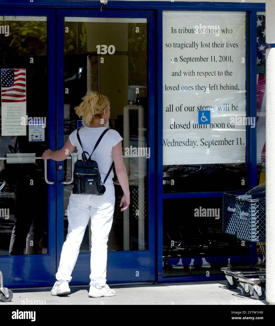 Mountain View, California - Marshalls Department Stores were closed from 10am to noon on Wednesday, September 11, 2002 in observance of seven employees that were lost aboard one of the planes that crashed into the World Trade Center. The seven Marshall Department Store employees were on a buying trip flying from Boston to Los Angeles.  Marshall's headquarters is in Boston, MA. Stock Photo
