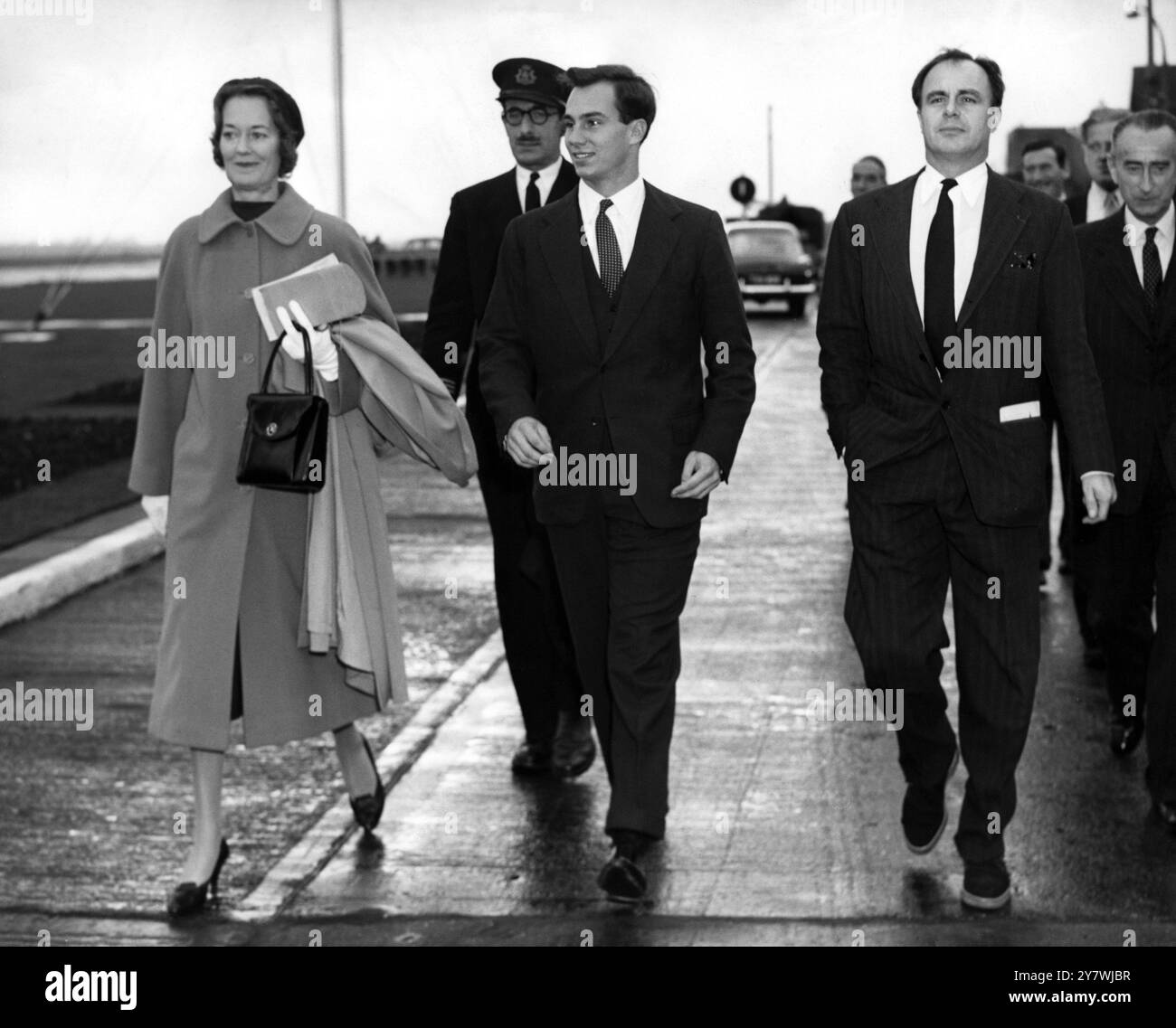 Shah Karim al-Hussayni : Born 13 December 1936 Prince Karim Aga Khan , seen here at London Airport with his parents , Prince Aly Khan and Princess Joan Aly Khan who accompanied him when he boarded a BOAC liner for Dar-es-Salaam , Tanganyika , where he is to be inducted as head of the Ismaili Muslims by East African leaders . The marriage of Princess Joan (formerly Mrs Loel Guinness ) to Prince Aly Khan was dissolved in 1949 16 October 1957 Stock Photo