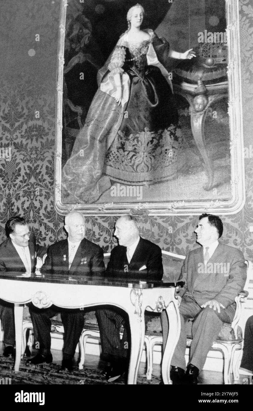 Soviet prime minister Nikita Khrushchev with Austrian president Adolf Schaerf ( 2nd from right ) is seen seated under a large painting of Maria Theresa in the Presidential Palace shortly after his arrival in Vienna this evening , in preparation for his weekend talks with U . S . President John F . Kennedy . 2 June 1961 Stock Photo