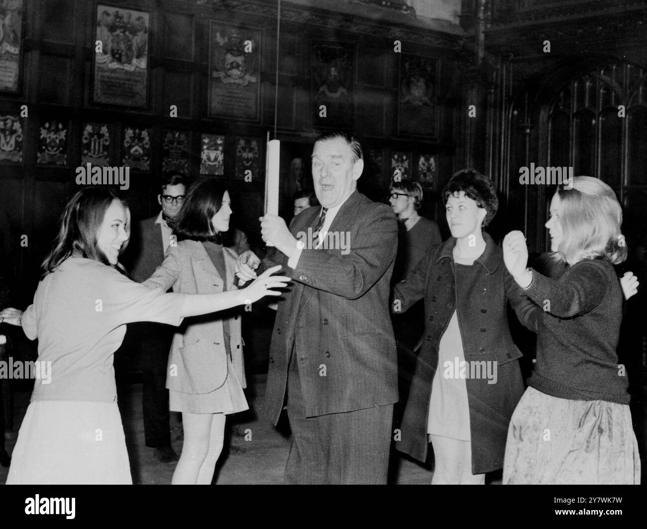 Judge Edward Clark is photographed here with a bevy of young ladies ...