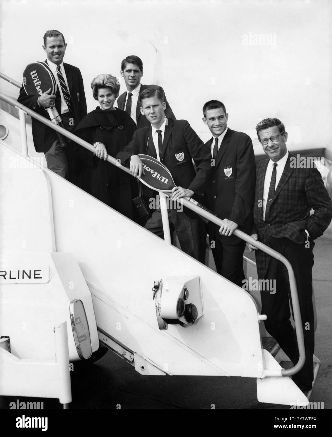 Members of the American Davis Cup team on arrival at London Airport.  They include Robert Kelleher the captain, Martin Riessen , Frank Froehling , Dennis Ralston , Mr and Mrs Chuck McKinley.  The Americans play Britain at Bournemouth beginning on 26 September 1963 - Photo taken 17 September 1963. ©TopFoto Stock Photo