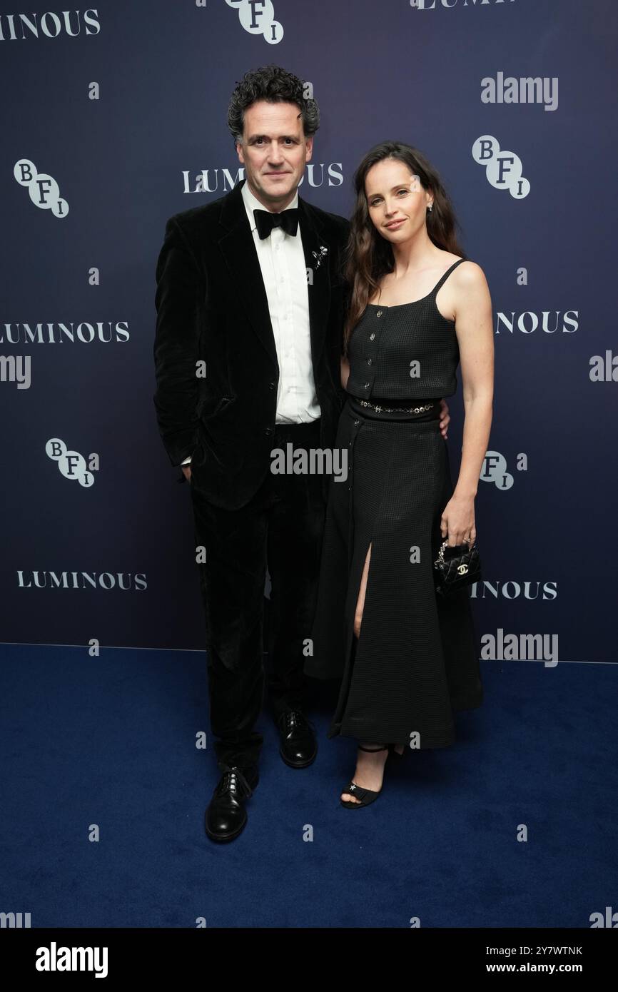 Felicity Guard Charles Guard and Felicity Jones arriving at the BFI fundraising ...