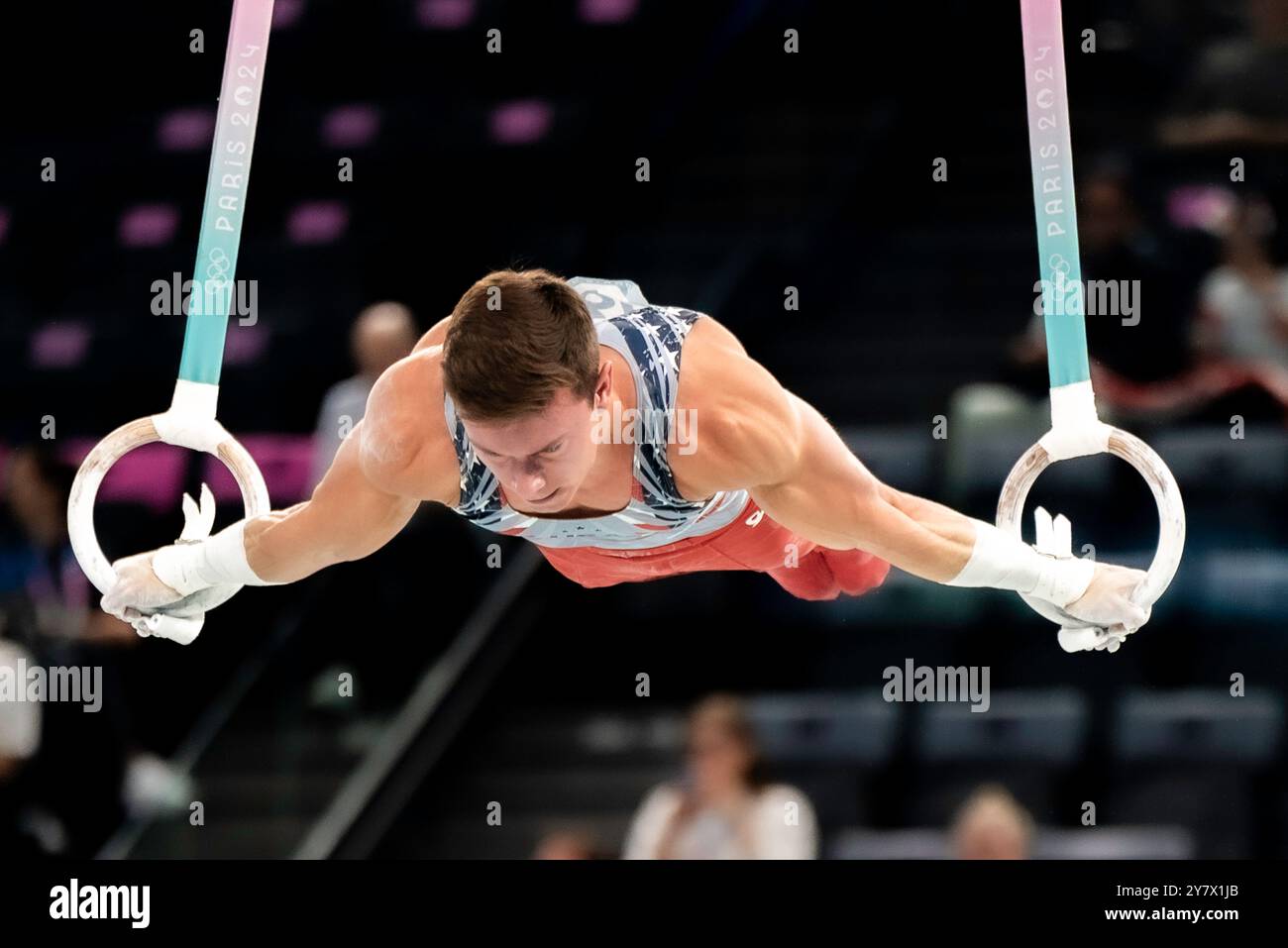 Brody Malone (USA) competing on the rings during the Artistic Gymnastics Men's Team Final at the 2024 IOlympic Summer Games. Stock Photo