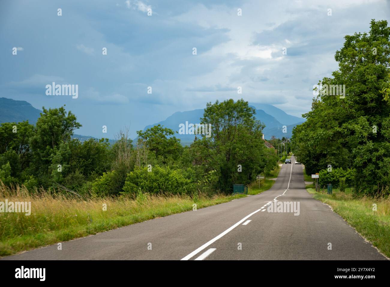 Driving car or camper on free road Route Napoleon in French Alps ...