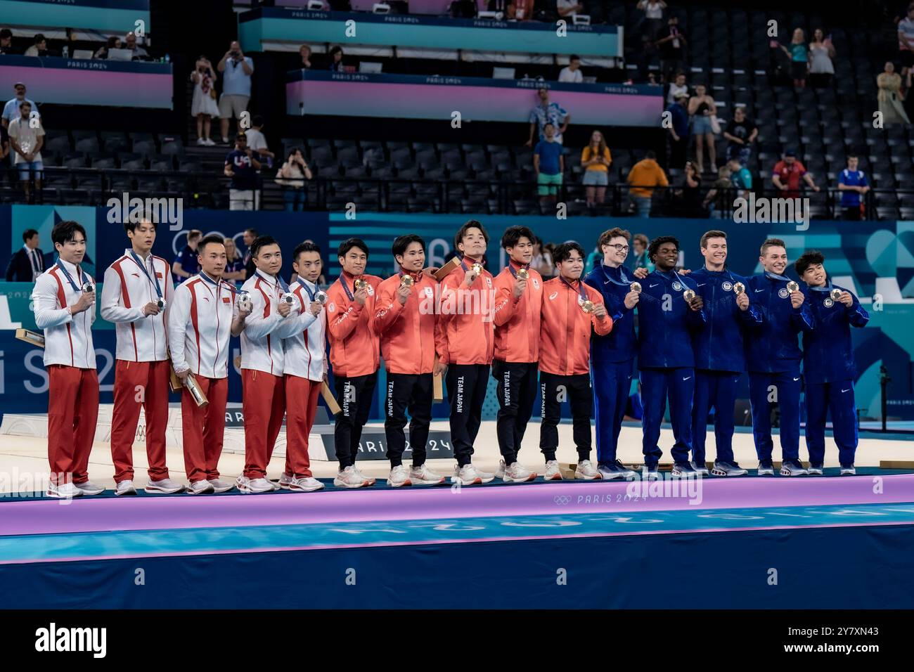 Team Japan , Gold, Team Chine, Silver and Tean USA Bronze during the Artistic Gymnastics Men's Team Final at the 2024 IOlympic Summer Games. Stock Photo