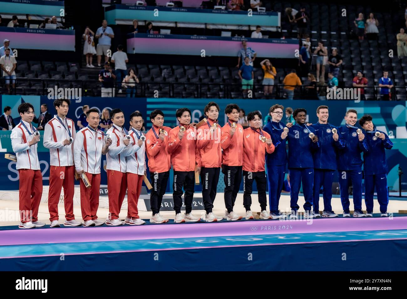 Team Japan , Gold, Team Chine, Silver and Tean USA Bronze during the Artistic Gymnastics Men's Team Final at the 2024 IOlympic Summer Games. Stock Photo