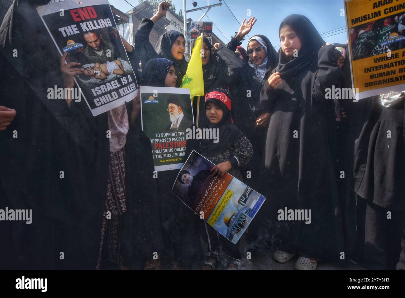 Kashmiri Shiite Muslims shout slogans during a protest against the ...