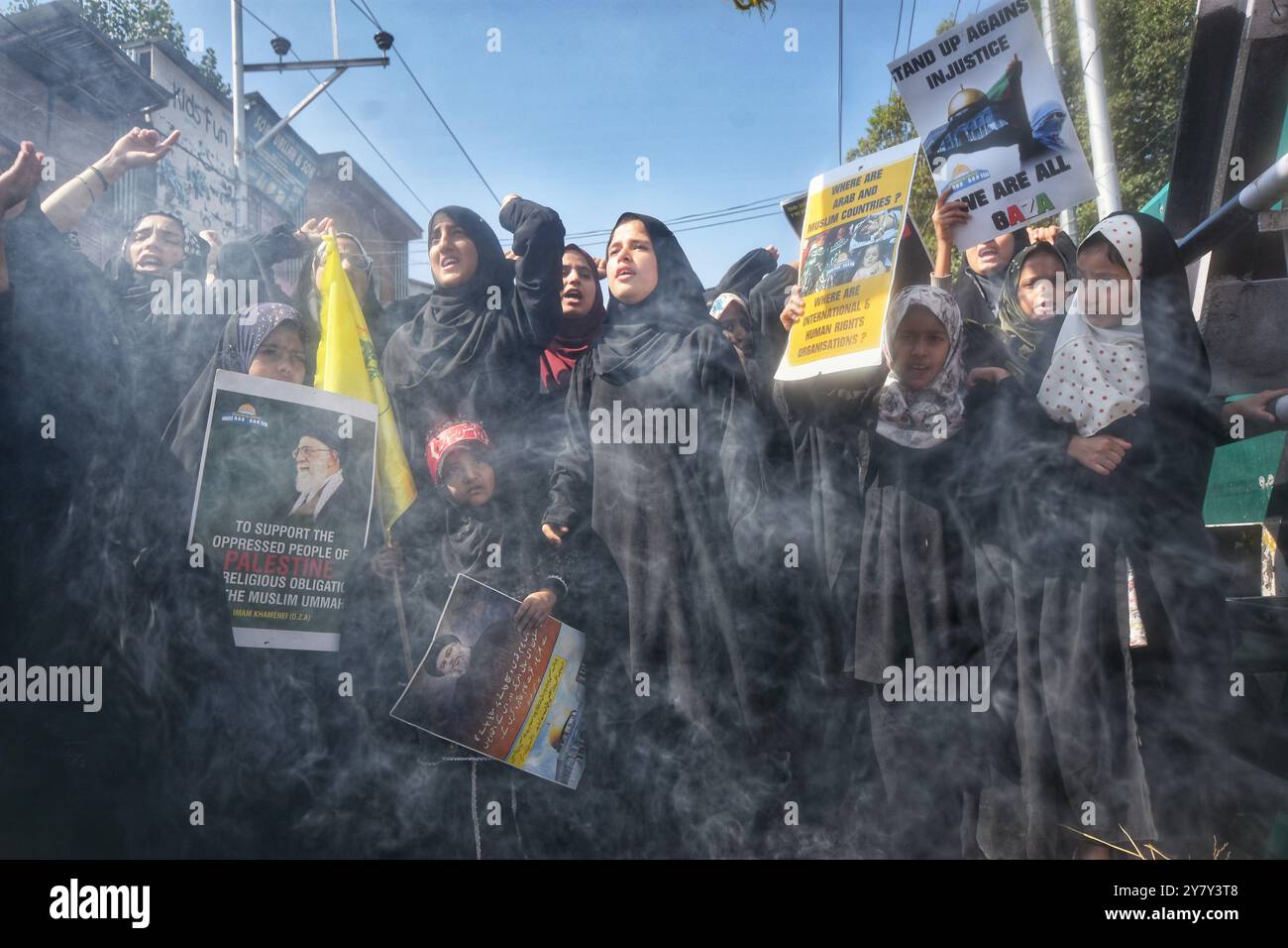 Kashmiri Shiite Muslims shout slogans during a protest against the ...
