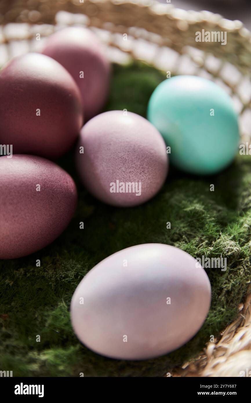 Colourful Easter eggs in a basket Stock Photo