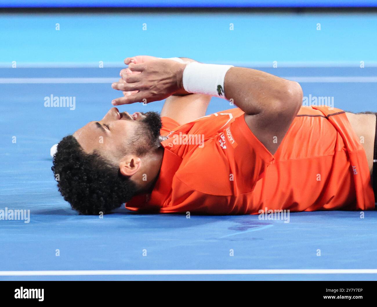 Tokyo, Japan. 1st Oct, 2024. Arthur Fils of Francei lies down on the court as he won the Japan Open Tennis championships at the Ariake Colosseum in Tokyo on Tuesday, October 1, 2024. Fils defeated his compatriot Ugo Humbert in the final. (photo by Yoshio Tsunoda/AFLO) Stock Photo