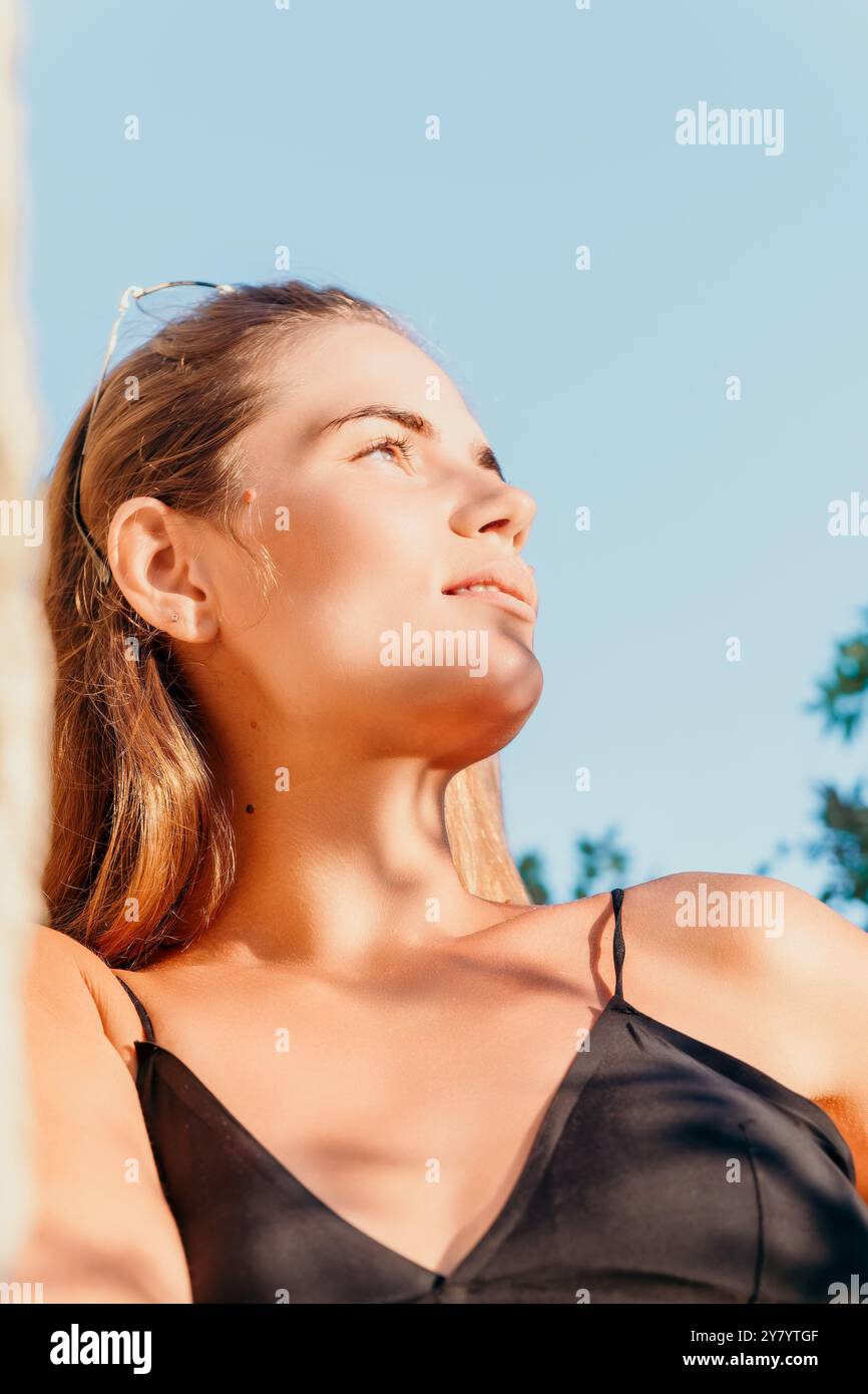 Girl wearing black tank top hi-res stock photography and images - Alamy
