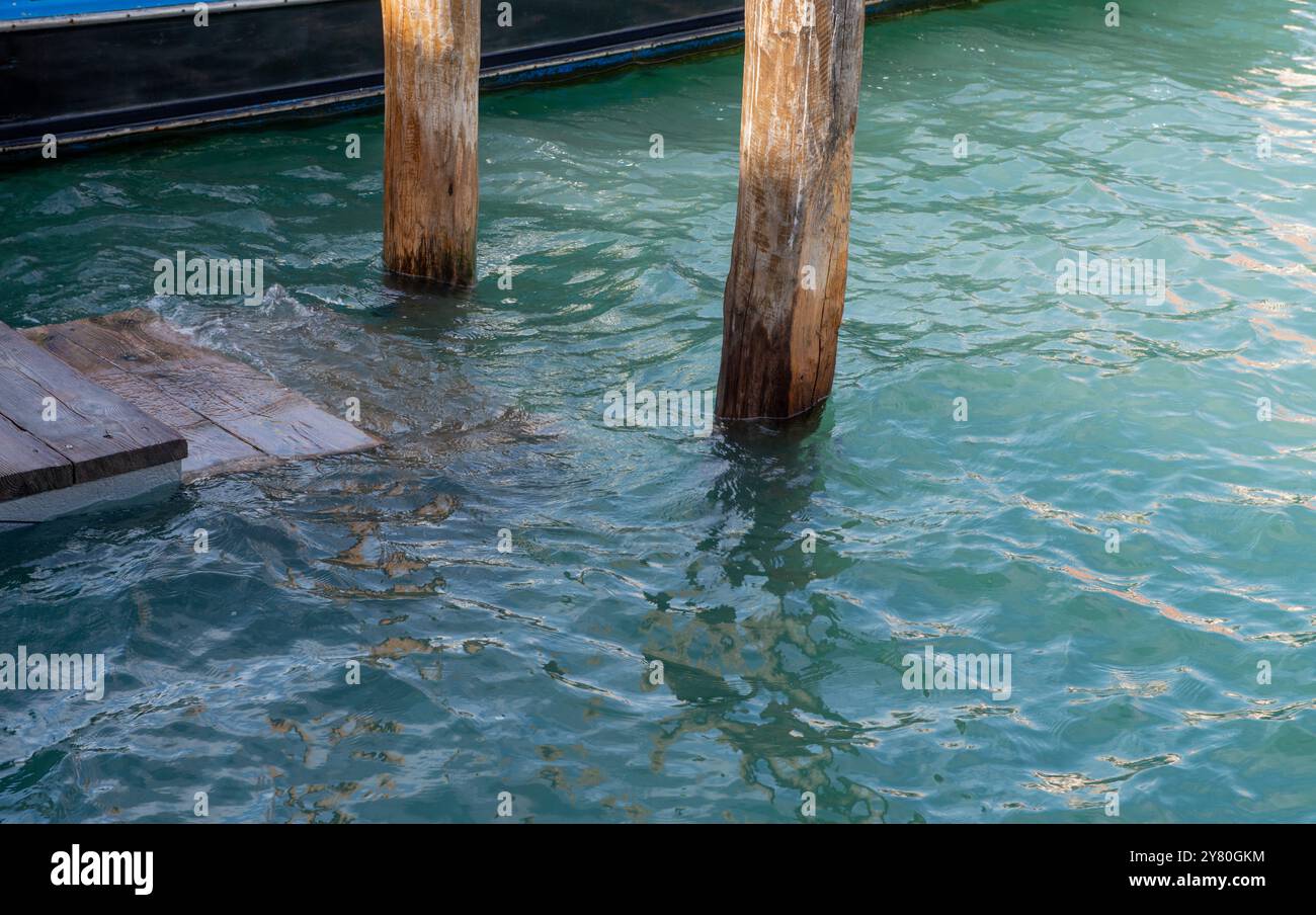 Venice Boat Docking with High Water Stock Photo - Alamy