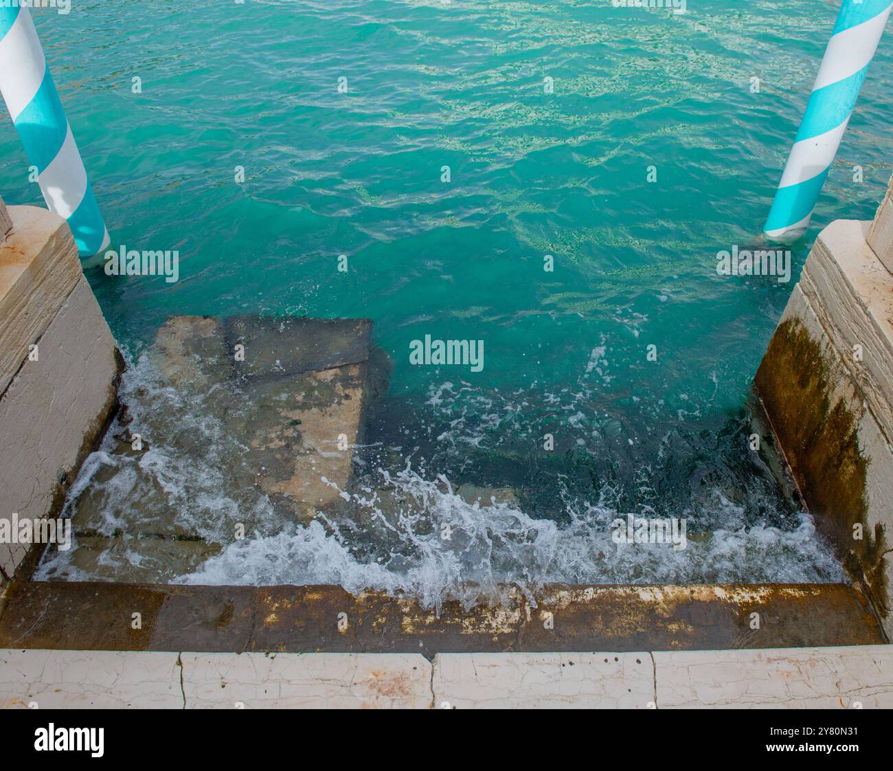 Venice Boat Docking with High Water Stock Photo - Alamy