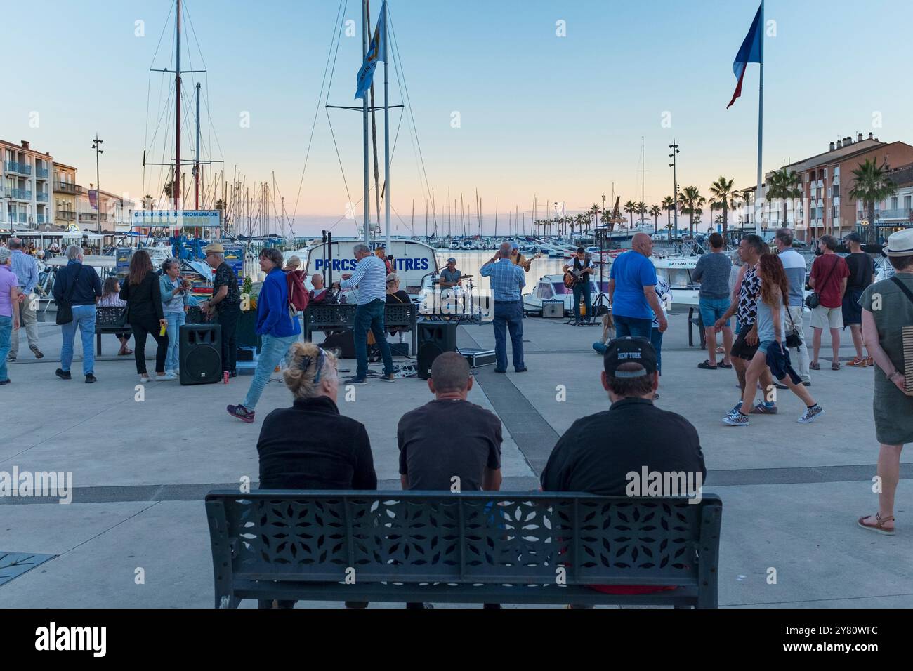 Band playing music at port during Music Festival in summer evening, Meze, Herault, Occitanie, France, Europe Stock Photo
