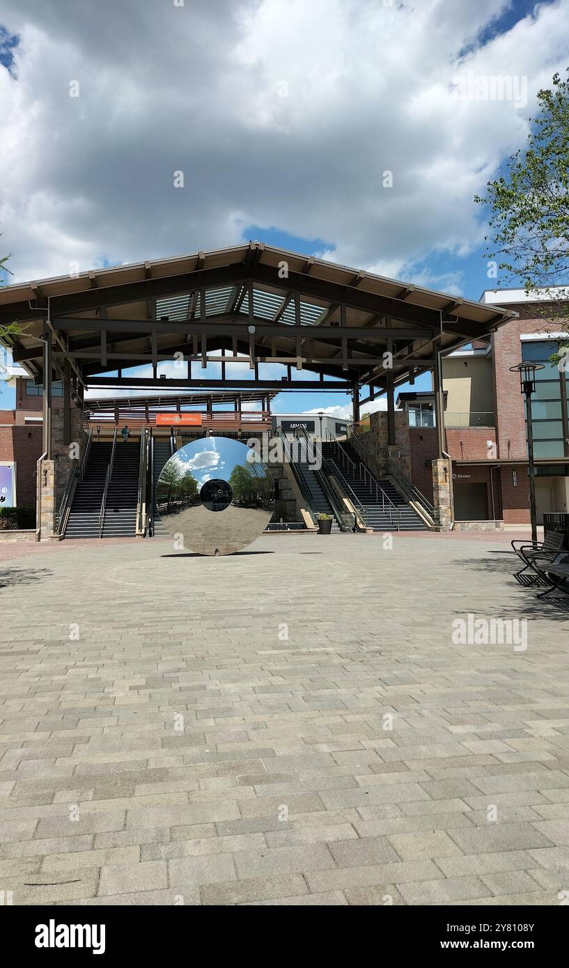Exploring the Vibrant Interior and Stylish Exterior of a Washington's Outlet Mall - Smartphone Captured Stock Image