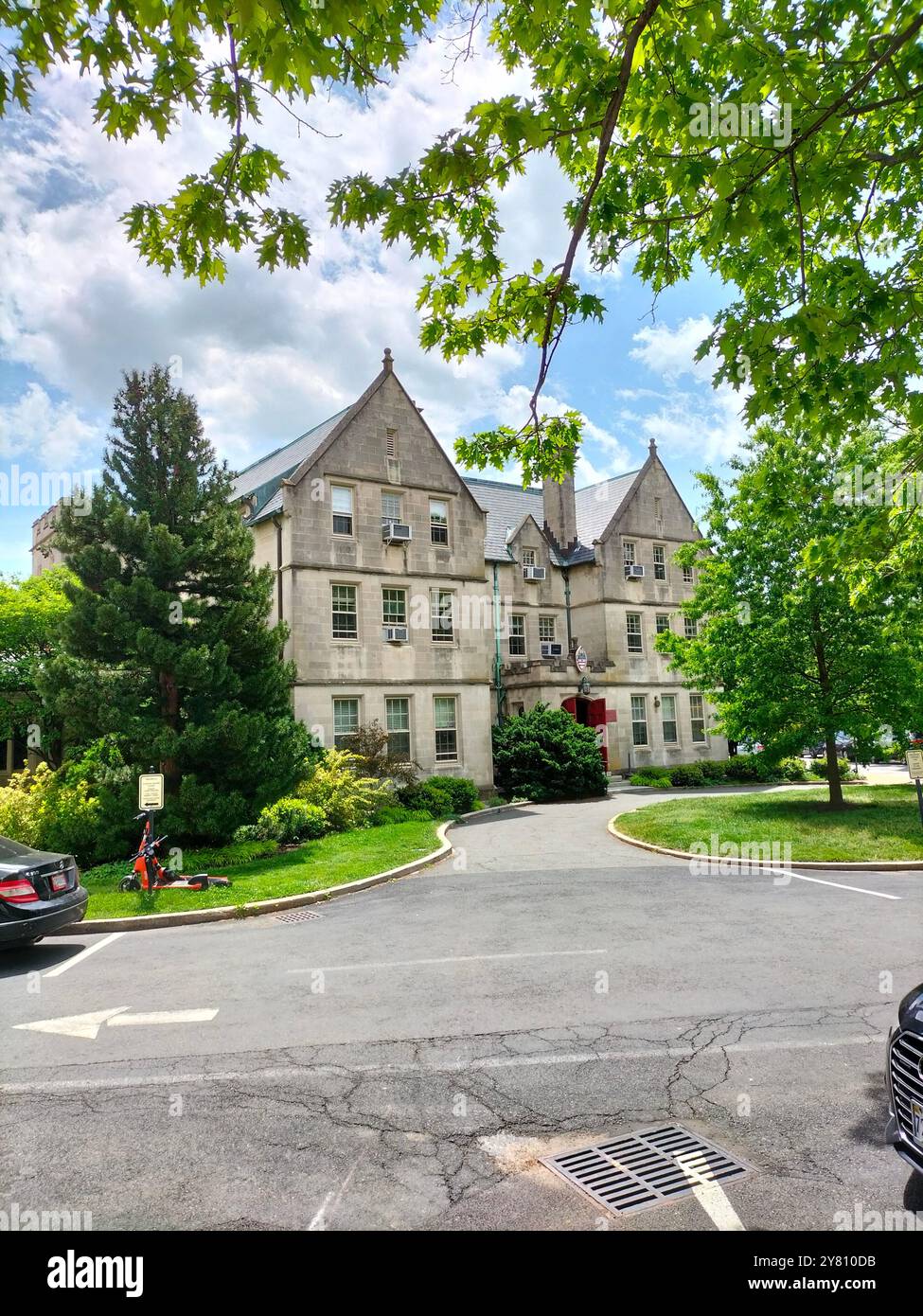 Architectural Marvel and Lush Greenery Surrounding Washington National Cathedral - Smartphone Captured Stock Image