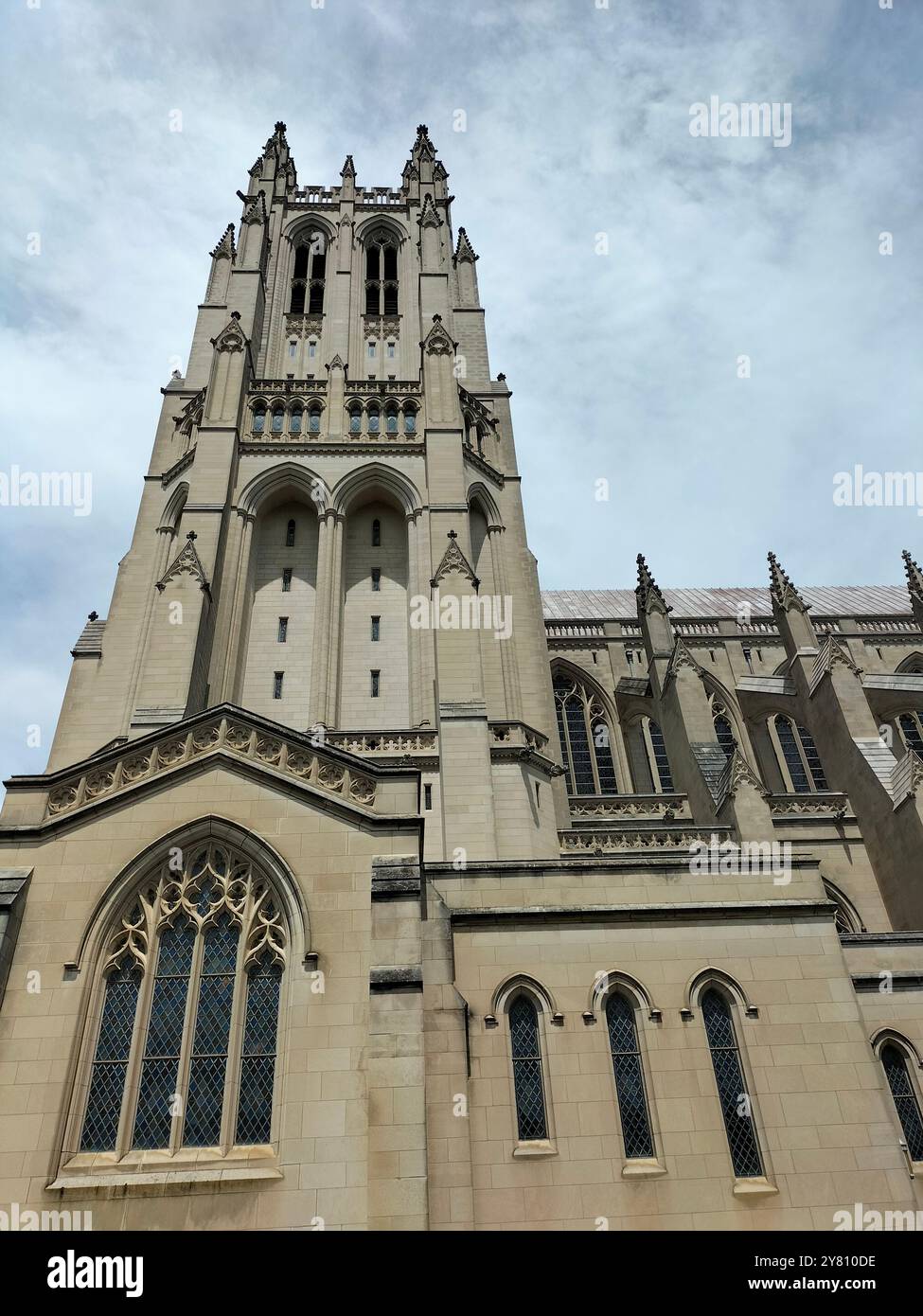Architectural Marvel and Lush Greenery Surrounding Washington National Cathedral - Smartphone Captured Stock Image