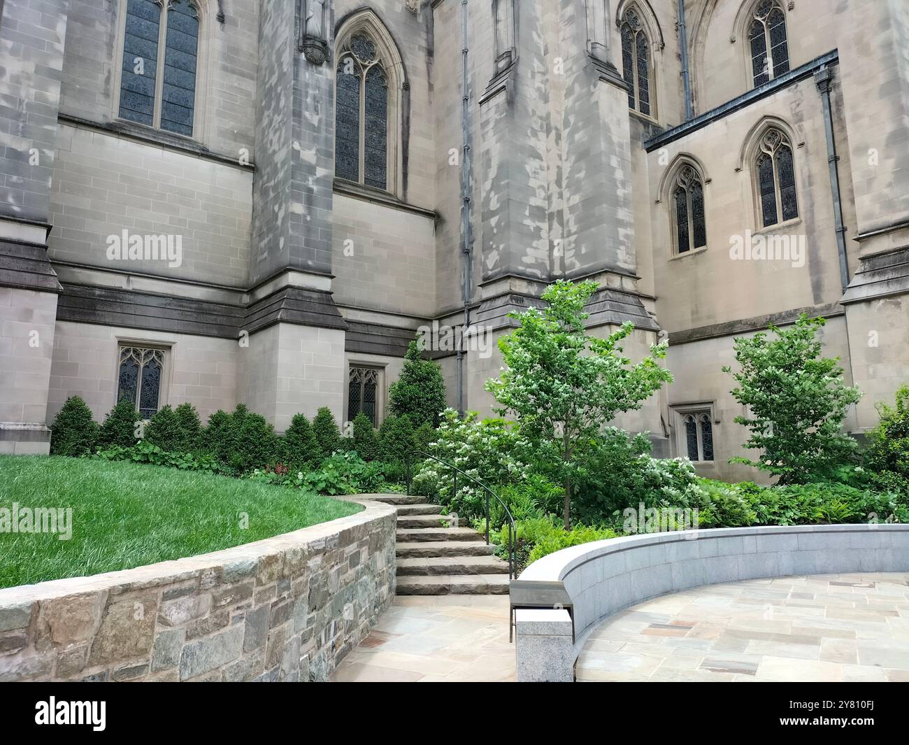 Architectural Marvel and Lush Greenery Surrounding Washington National Cathedral - Smartphone Captured Stock Image