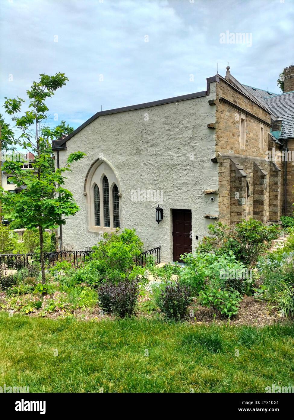 Architectural Marvel and Lush Greenery Surrounding Washington National Cathedral - Smartphone Captured Stock Image