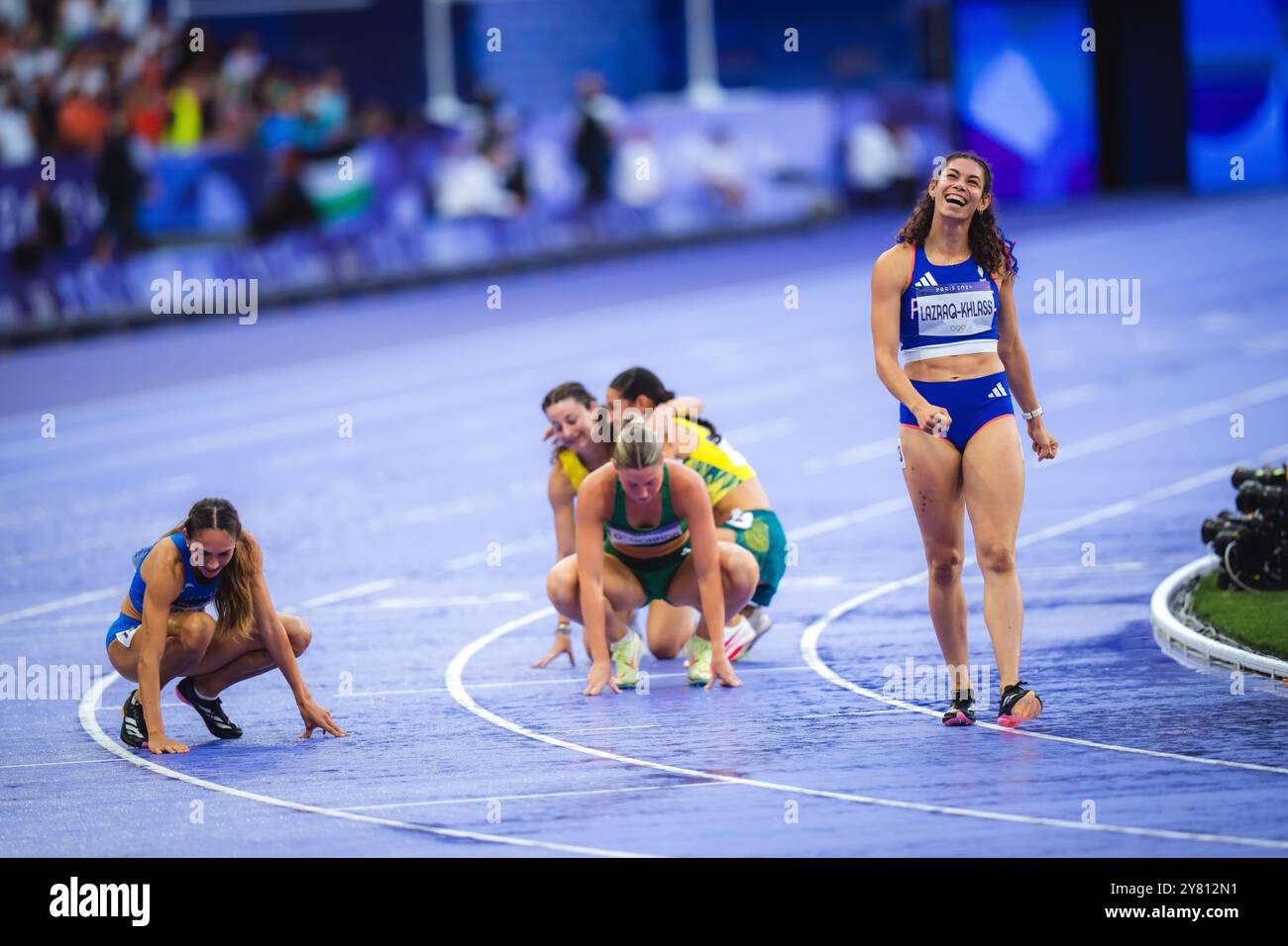 Lazraq Auriana Lazraq-Khlass celebrating and waving to the French crowd during ...