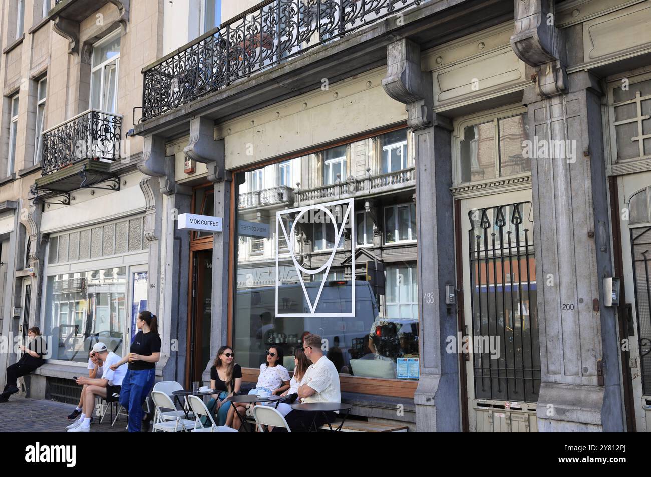 Fashionable Rue Antione Dansaert with high end boutique shops, restaurants & cafes, in Brussels, Belgium. Stock Photo