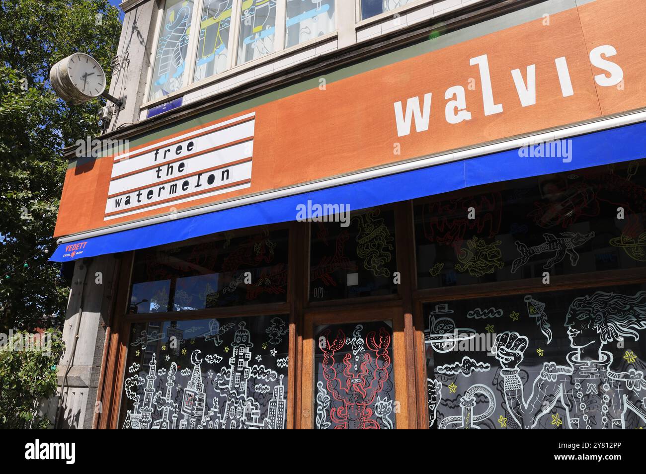 Fashionable Rue Antione Dansaert with high end boutique shops, restaurants & cafes, in Brussels, Belgium. Stock Photo
