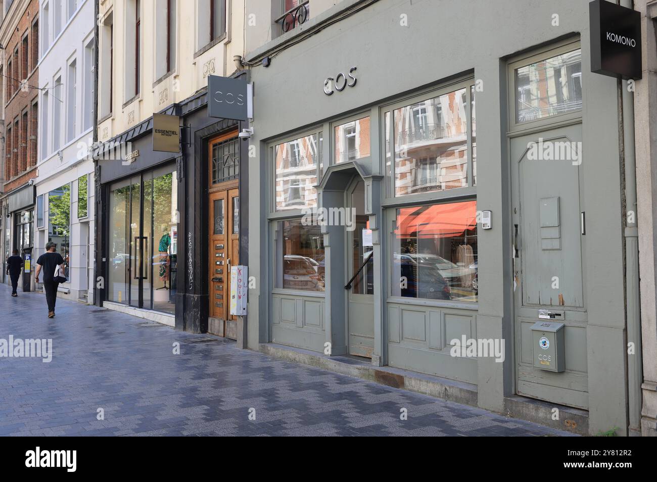 Fashionable Rue Antione Dansaert with high end boutique shops, restaurants & cafes, in Brussels, Belgium. Stock Photo