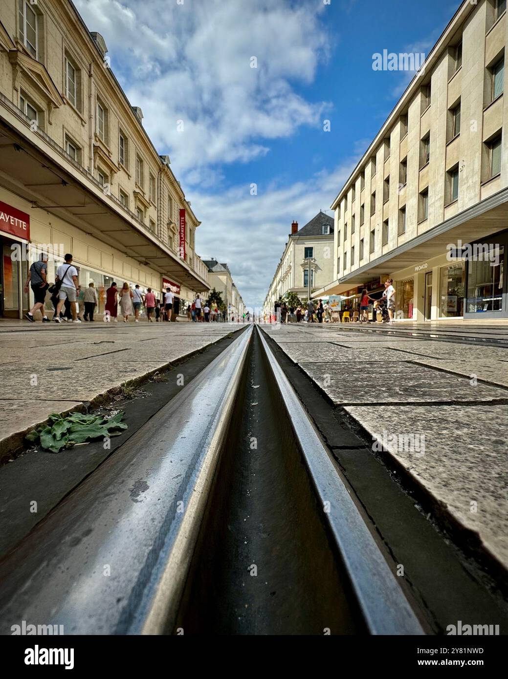 Low angle view of tram track, looking up Rue Nationale, Tours, France - Smartphone Captured Stock Image