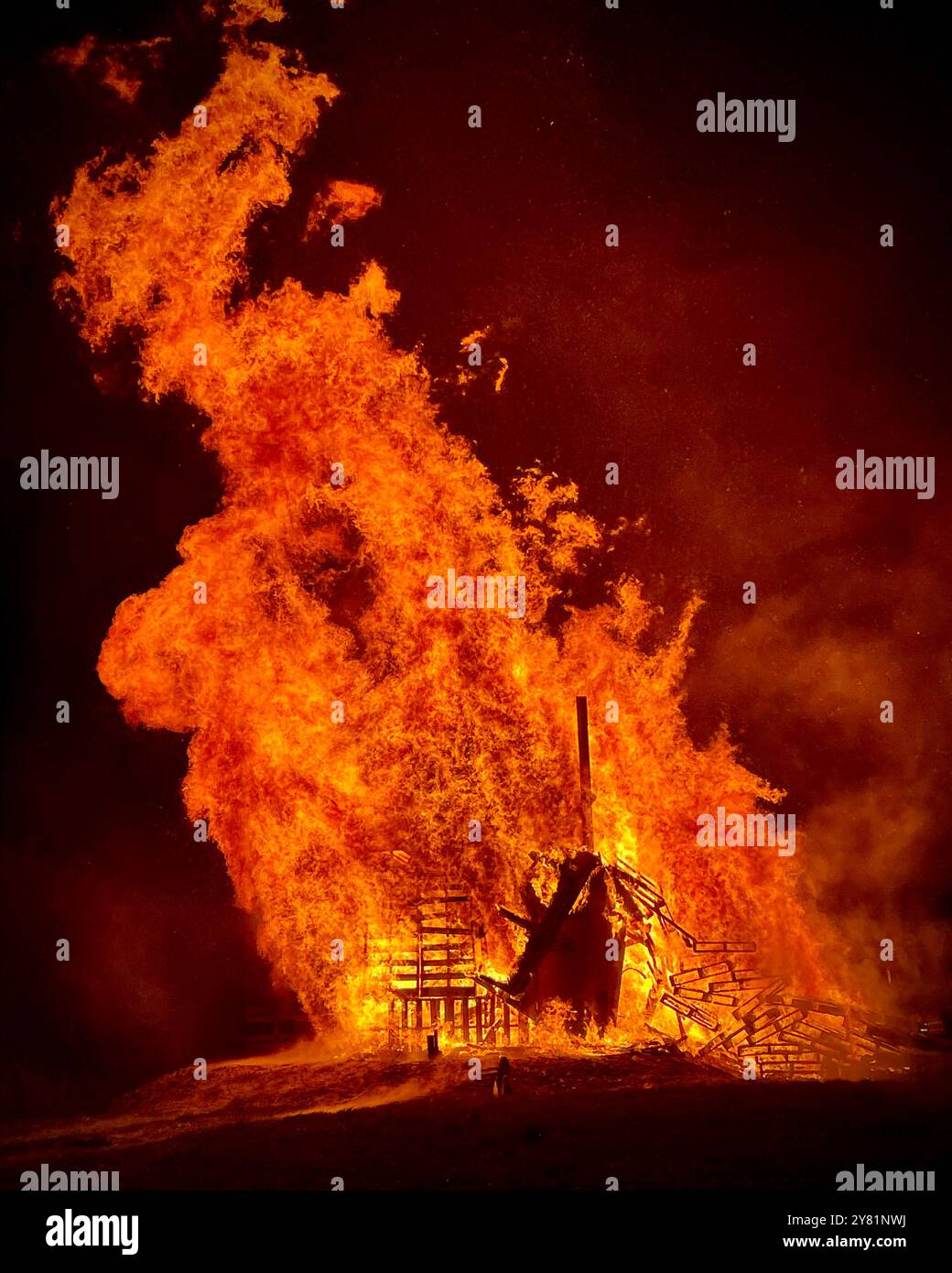 Raging bonfire at night - Smartphone Captured Stock Image